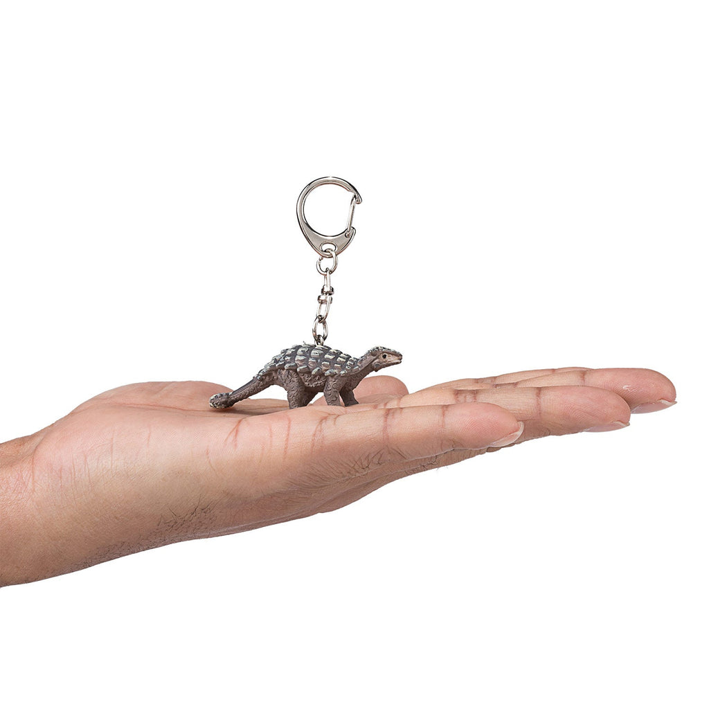 Sleutelhanger Ankylosaurus op hand