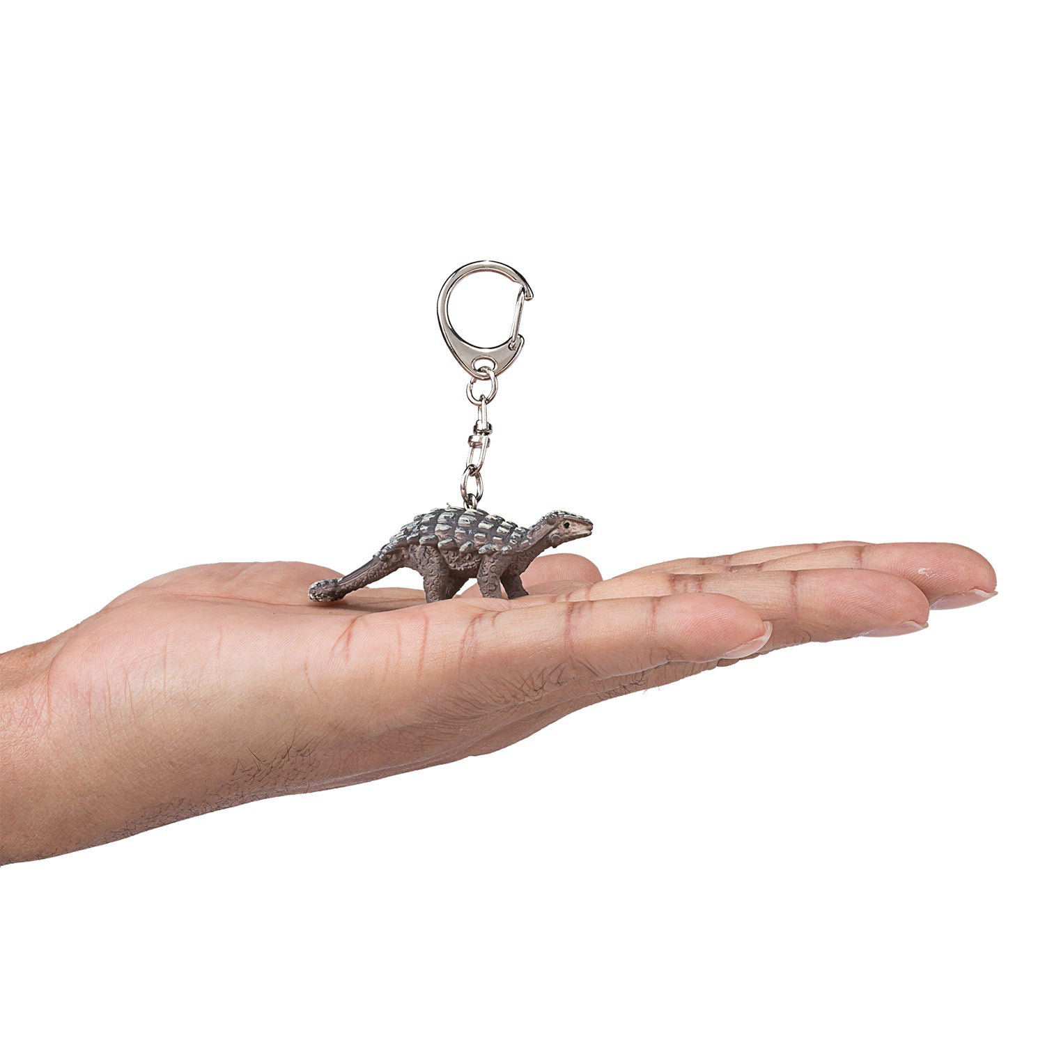 Sleutelhanger Ankylosaurus op hand